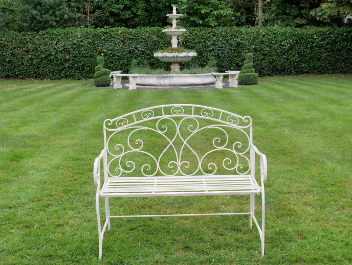 ornate bench in cream